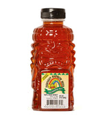 24oz bottle of Macadamia Nut Honey by Rainbow Bees.
