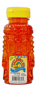 9oz tiki bottle of Christmas berry gourmet honey from Hawaii.